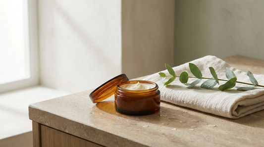Unscented, fragrance-free tallow balm in a calm minimal bathroom setting